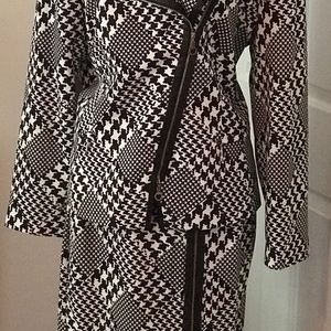 Ladies 2 piece suit black and white with asymmetrical zipper and leather trim